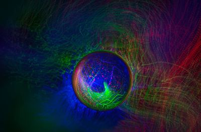 Digital composite image of illuminated ball