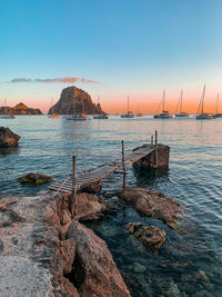 Scenic view of sea against clear sky during sunset in ibiza 