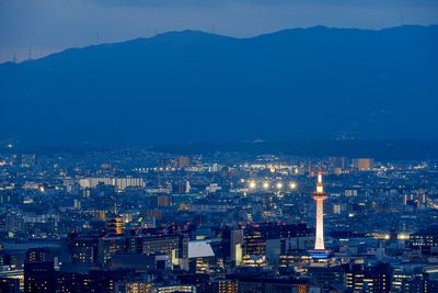 High angle view of illuminated buildings in city