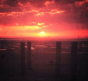 Scenic view of sea at sunset