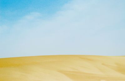 Scenic view of desert against sky