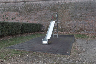 Metallic structure on footpath in park