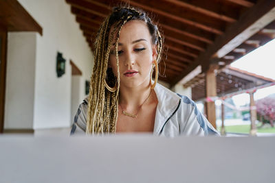 Portrait of woman using mobile phone