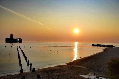 Scenic view of sea against sky during sunset