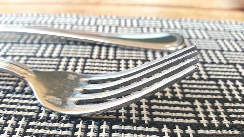 Close up of fork on placemat