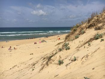 Scenic view of beach against sky