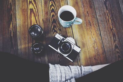 High angle view of coffee cup on table