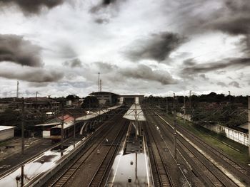 High angle view of train in city against sky