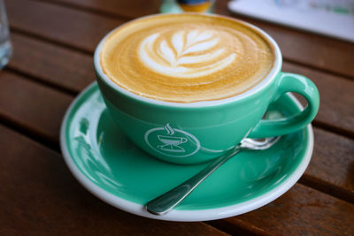 Close-up of cappuccino on table