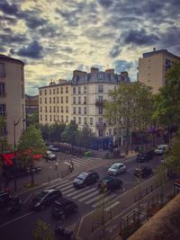 City street against cloudy sky