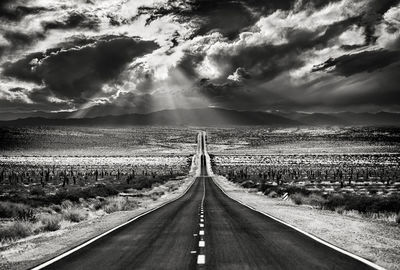 Panoramic view of empty road against sky