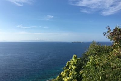 Scenic view of calm sea against sky