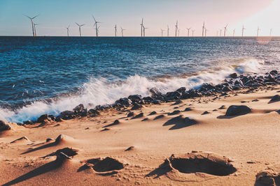 Scenic view of sea waves rushing towards shore