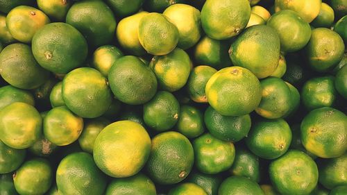 Full frame shot of lemons in market for sale
