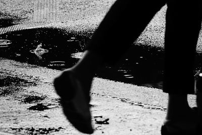 Low section of woman standing on floor