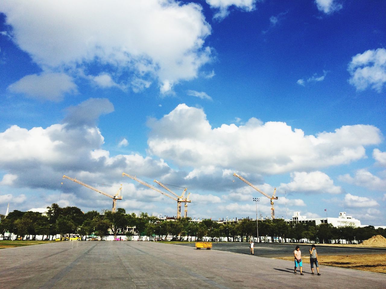 sky, cloud - sky, large group of people, cloudy, lifestyles, leisure activity, men, cloud, person, day, built structure, mixed age range, transportation, travel, incidental people, nature, outdoors, tourist, travel destinations