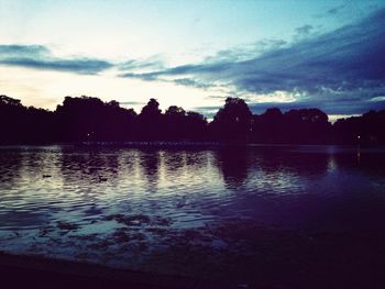 Scenic view of lake at sunset