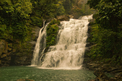 Beautiful tropical waterfall in the jungle of costa rica