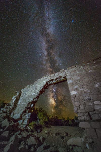 Low angle view of star field against sky at night