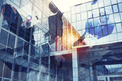 Reflection of buildings on glass window