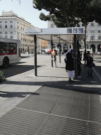 People on street in city