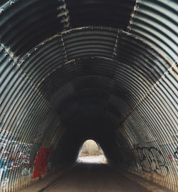 Low angle view of bridge in tunnel