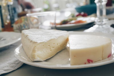 Close-up of brie cheese on plate