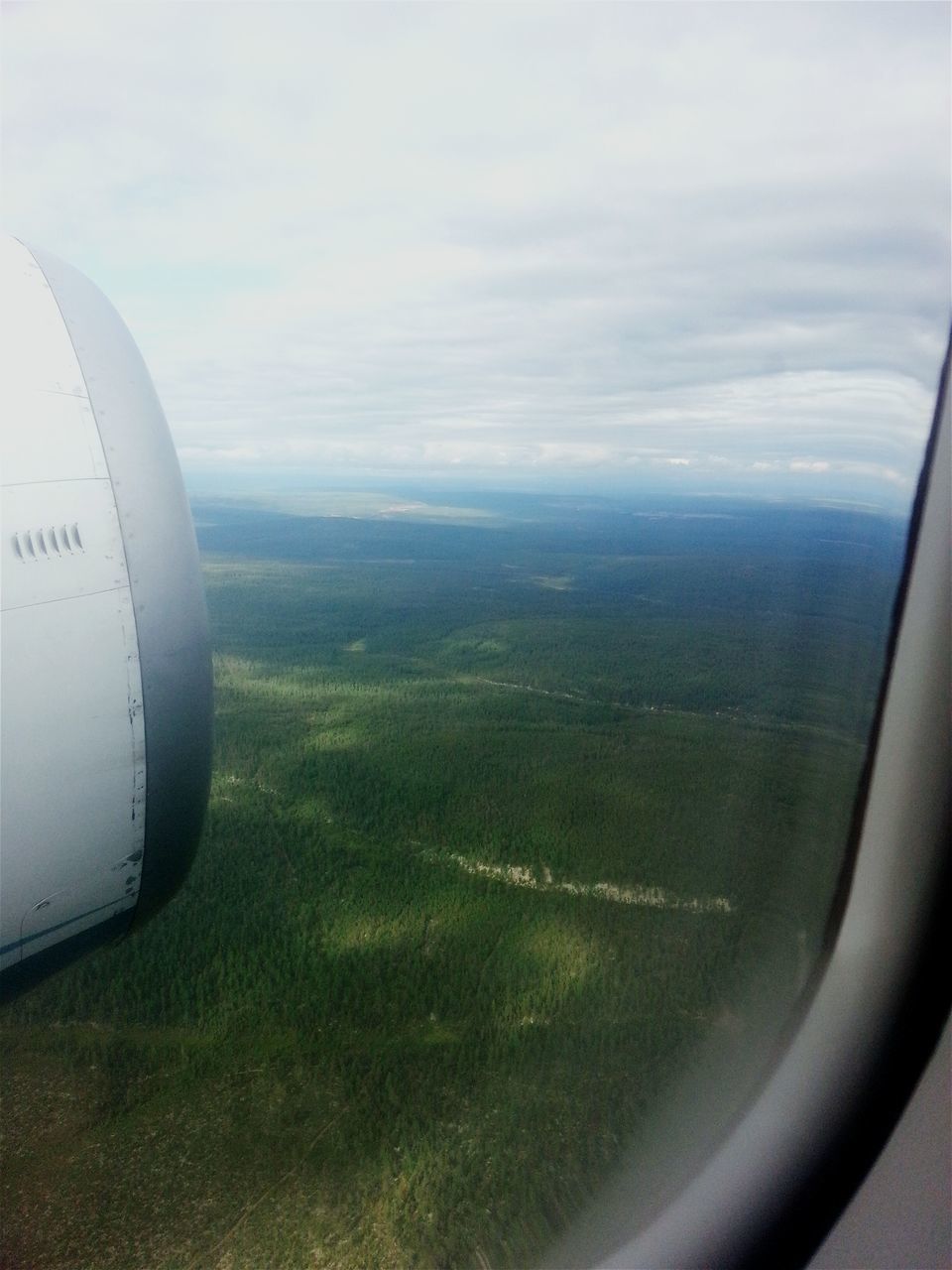 transportation, mode of transport, vehicle interior, sky, part of, cropped, aircraft wing, aerial view, journey, cloud - sky, landscape, mid-air, cloud, day, nature, vehicle part, no people, scenics, beauty in nature, cloudy