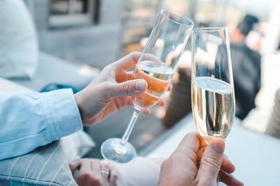 Close-up of hand holding wine glass