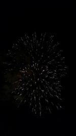 Firework display at night