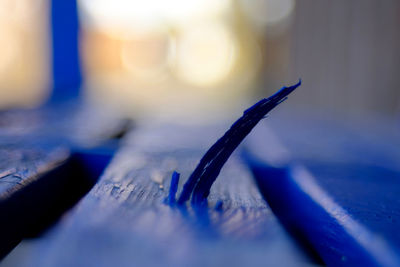 Close-up of blue metal on table