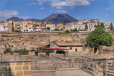 High angle view of townscape against cloudy sky