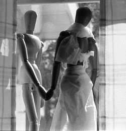 Rear view of men on floor