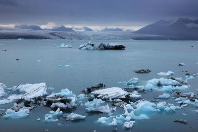 Scenic view of sea against sky during winter