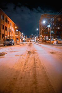 Cars on road in winter at night