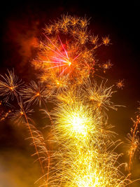 Firework display at night