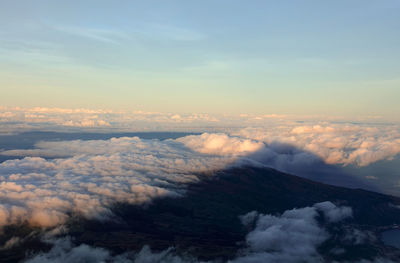 Aerial view of landscape against sky during sunset