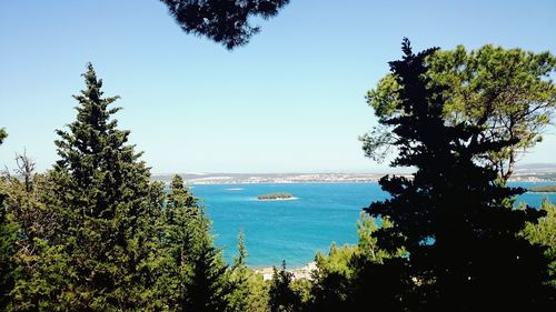 Scenic view of calm sea against clear sky