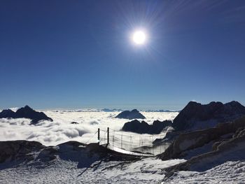 Scenic view of mountains against sky during winter