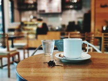 White coffee mug in cafe.
