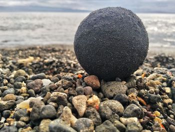 Close-up of stones on beach