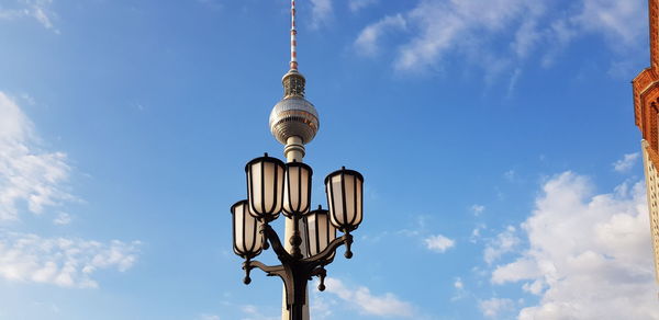 Low angle view of street light against sky