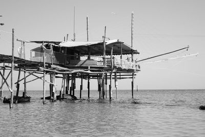 Stilt house in sea