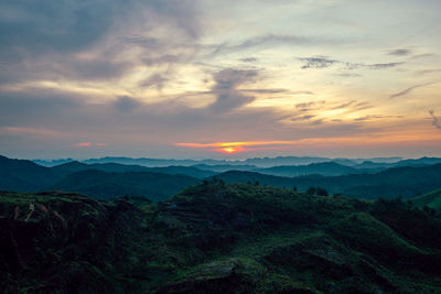 Scenic view of mountains against sky during sunset