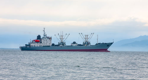 The trawler fishing boat sailing in ocean