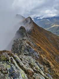 Scenic view of mountain range against sky