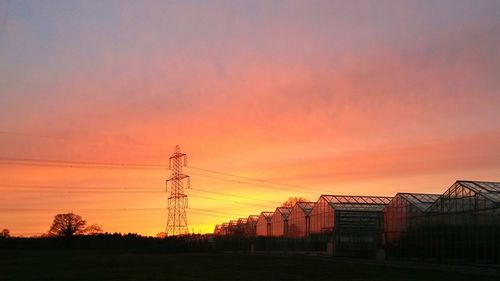 Electricity pylons at sunset