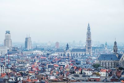 High angle view of city buildings against sky