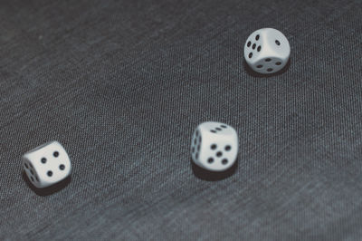Close-up of dice on fabric