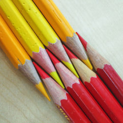 Close-up of colored pencils on table